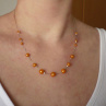 Oranžový perličkový náhrdelník sestup rozestupy