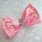 Čelenka s mašličkou.