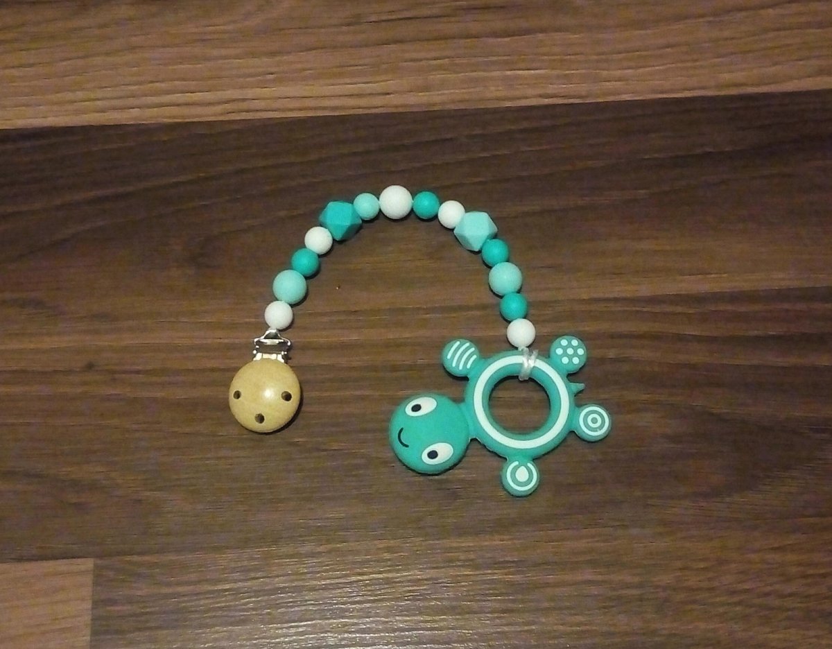 Silikonové kousátko s tmavší tyrkysovou želvičkou