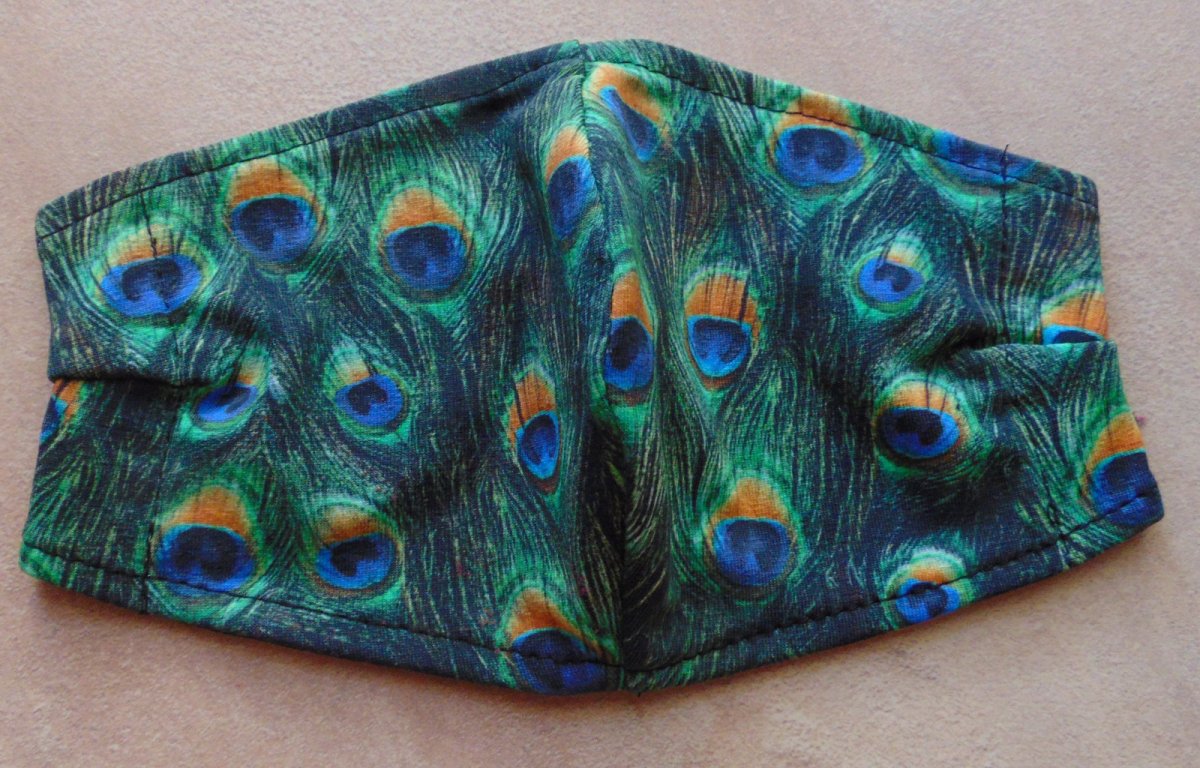 Rouška - paví péra