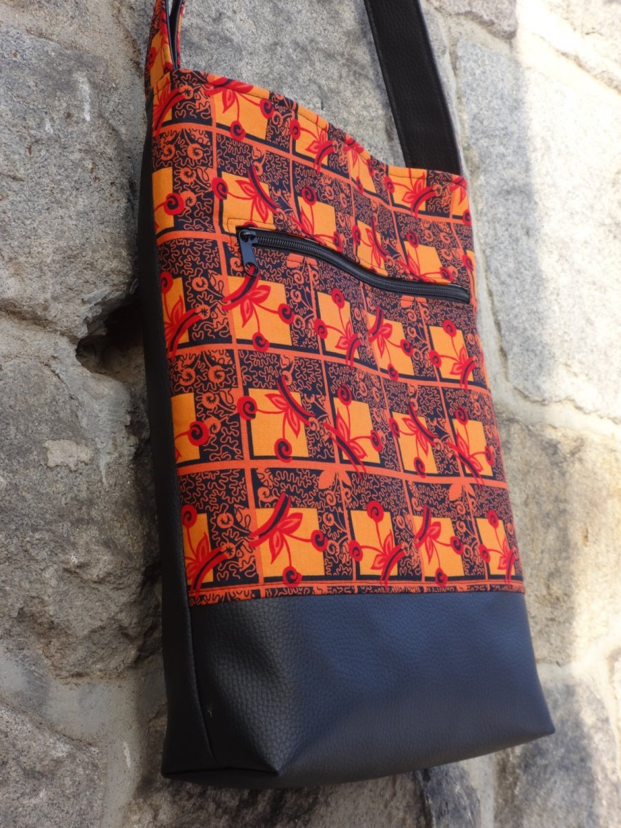 Černooranžová s koženkou