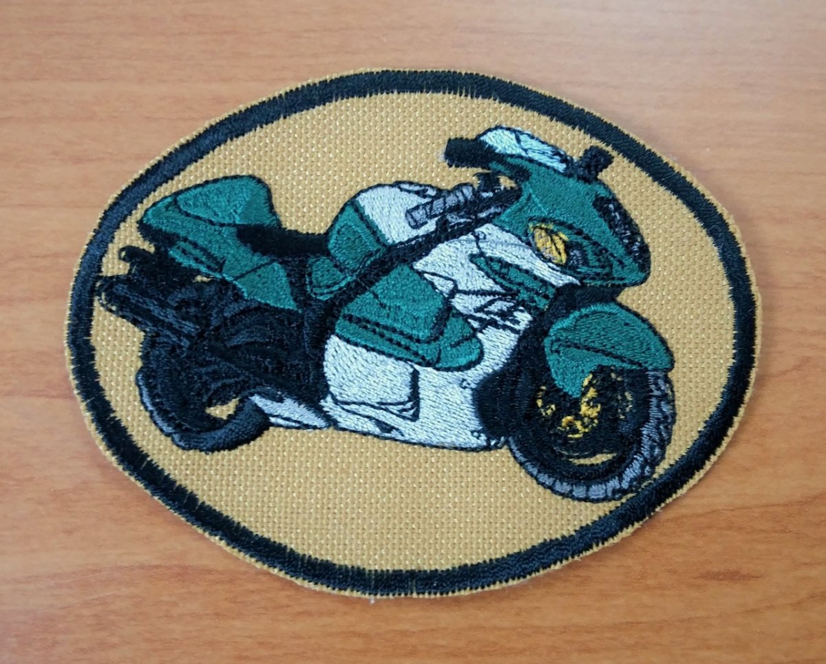 Zeleno stříbrná motorka