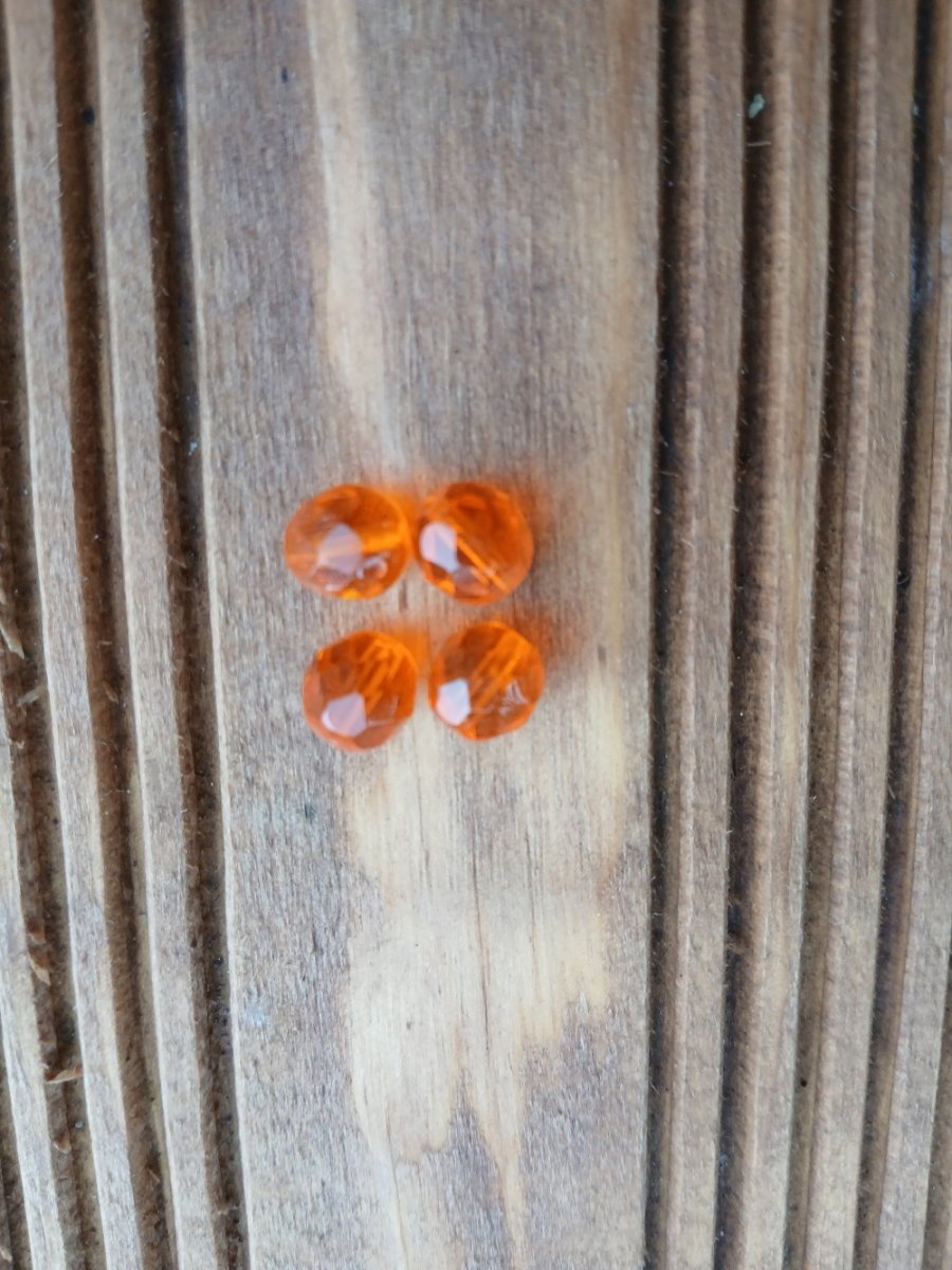 skleněný broušený korálek oranž