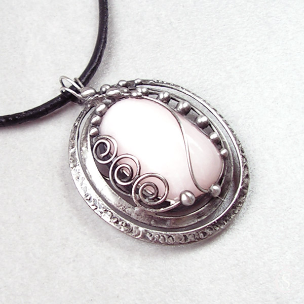 O souměrnosti - Manganokalcit