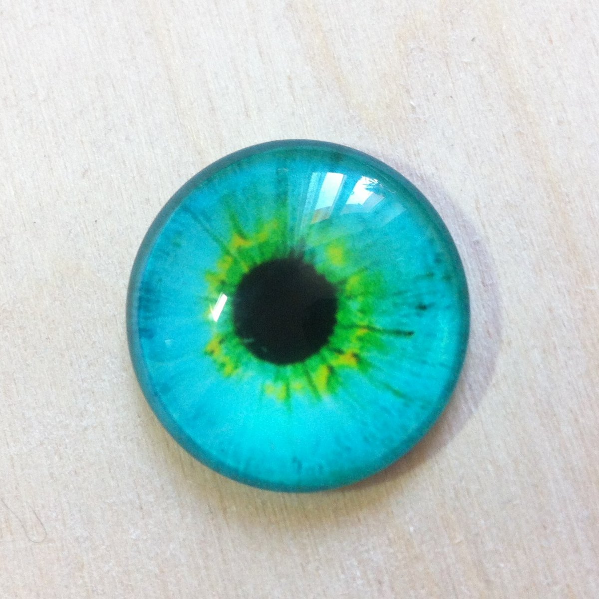 2940/C Kabošon Oko tyrkys 25 mm
