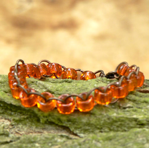 Náramek - ohnivý kruh