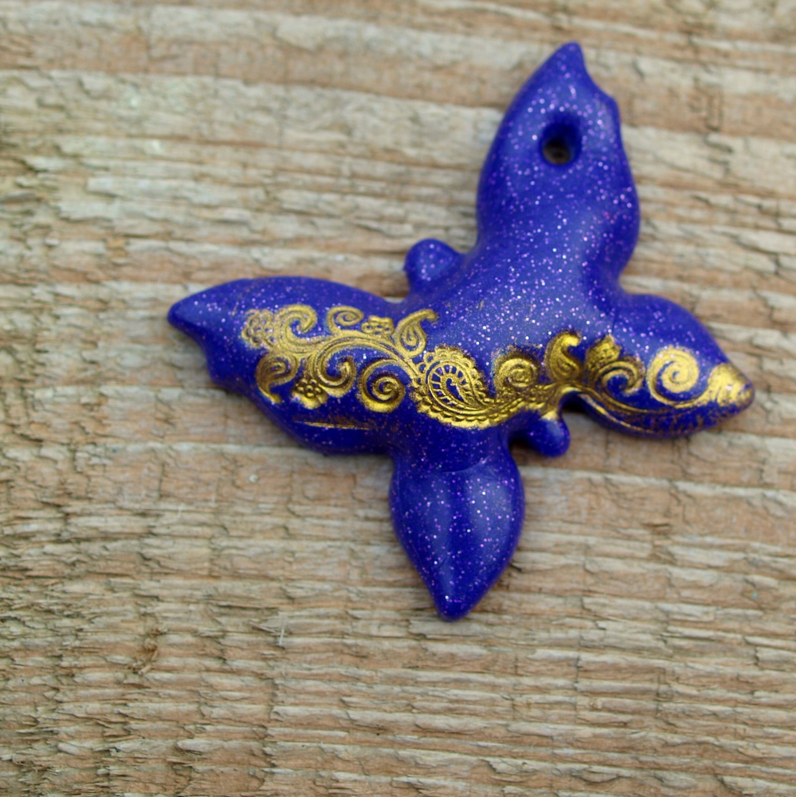 Orientální motýl na klíče