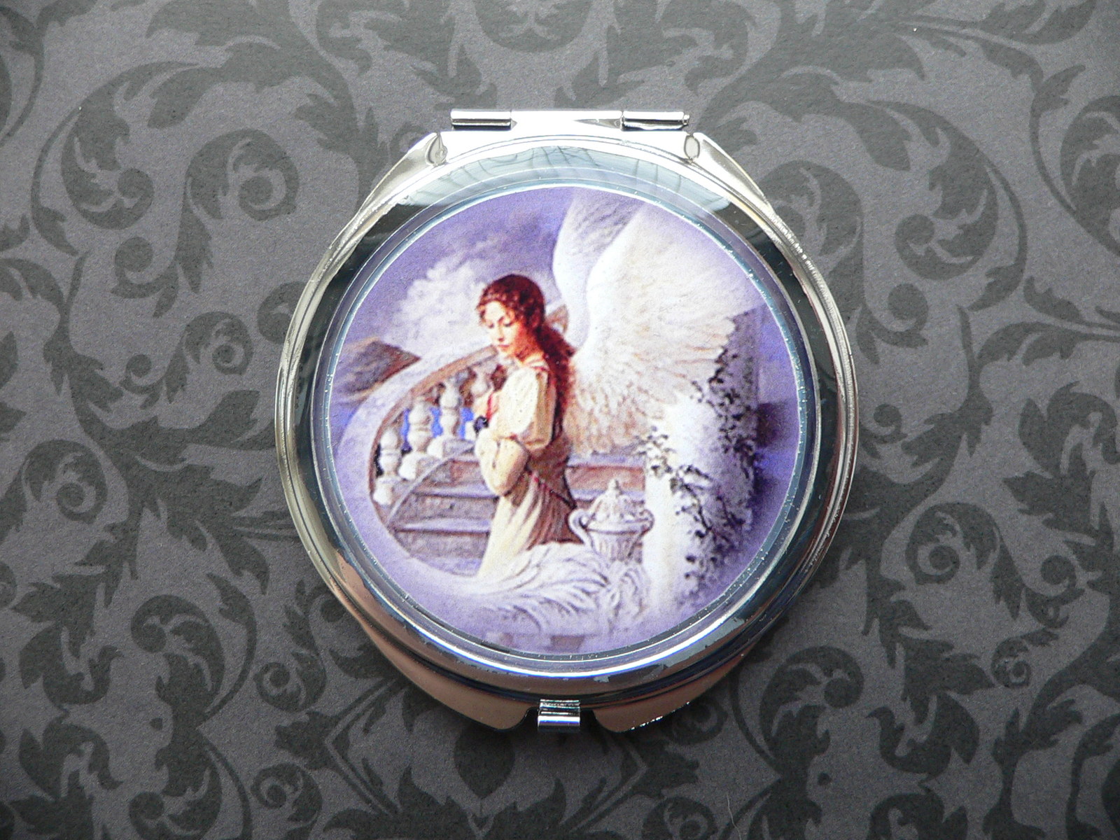 Anděl, kosmetické zrcátko