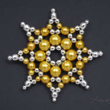 kovová hvězda žluto-stříbrná