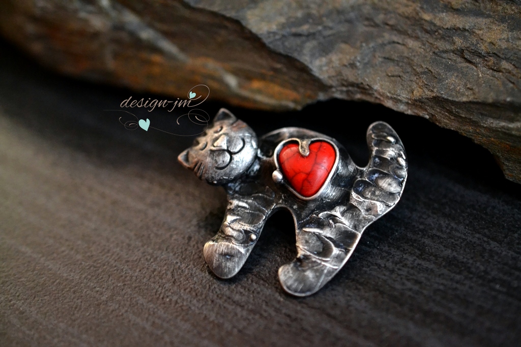 Ospalý kocourek....brož