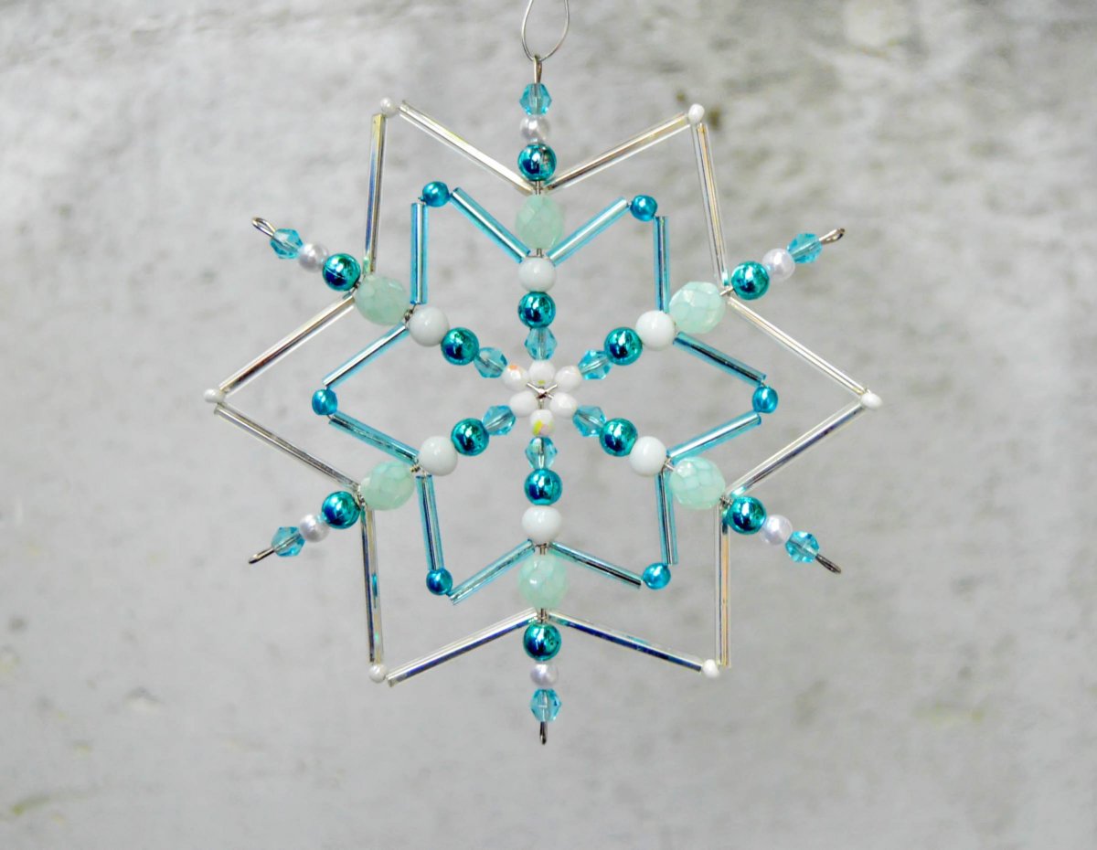 Zmrzlé kapky vody na hvězdě - ozdoba