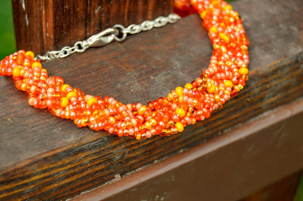 Pletený cop oranžový - náhrdelník