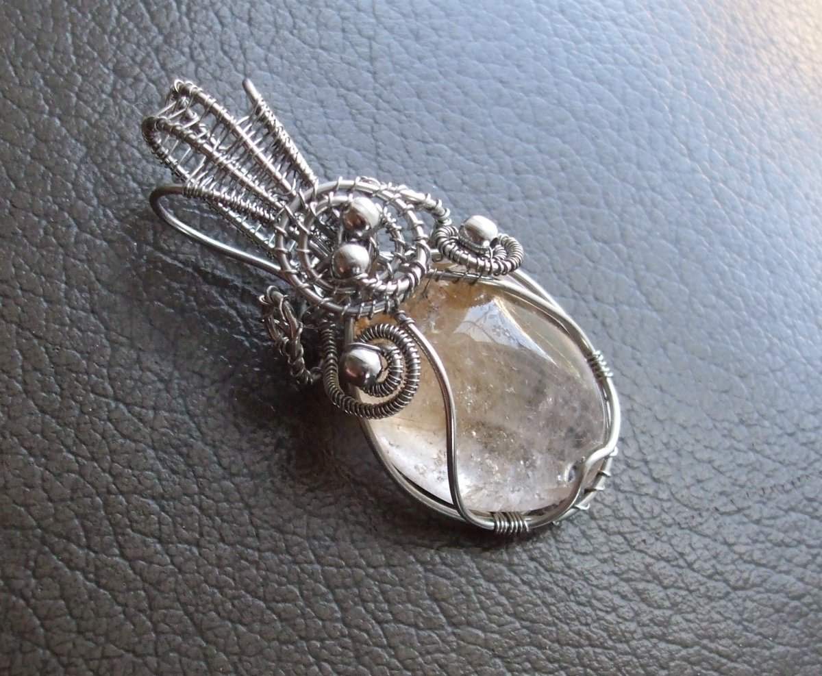 Křišťál Sagenit.