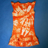 Dívčí mDívčí bílo-oranžové batikované šaty 7/8 (13404539)