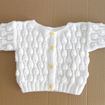 Ručně pletený kabátek v el. 56-62