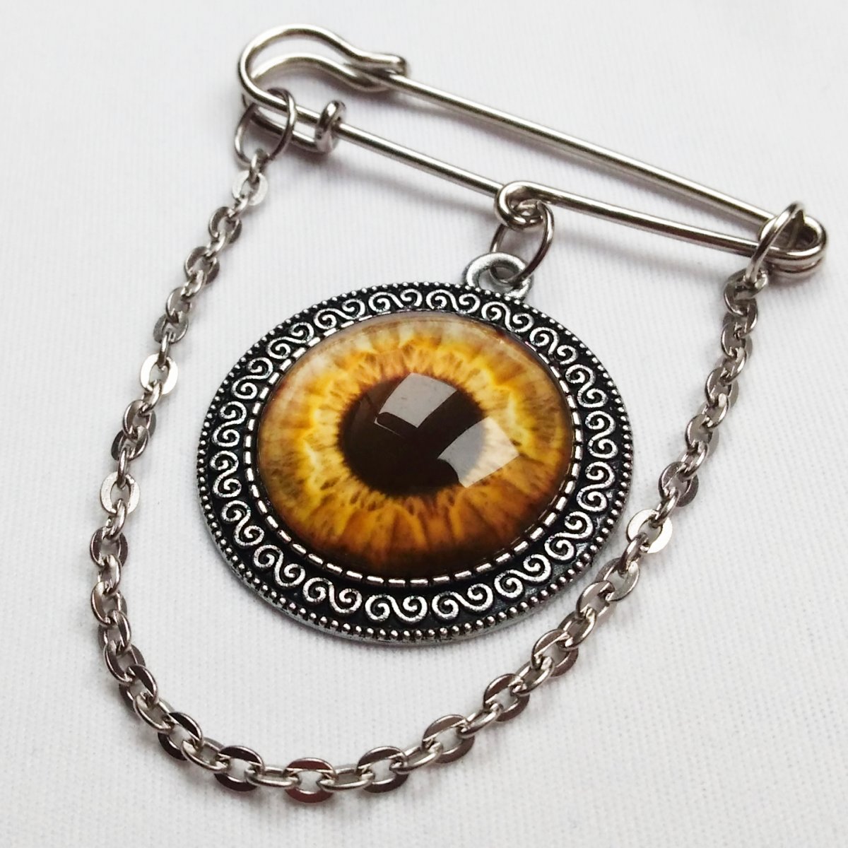 Ozdobný spínací špendlík, dračí oko