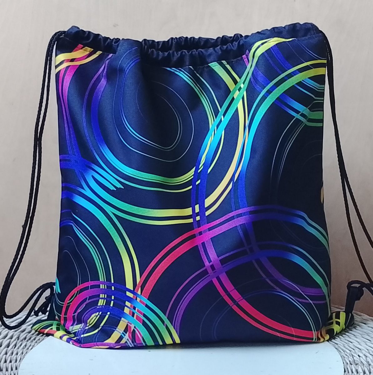 Stahovací vak L barevné kruhy 