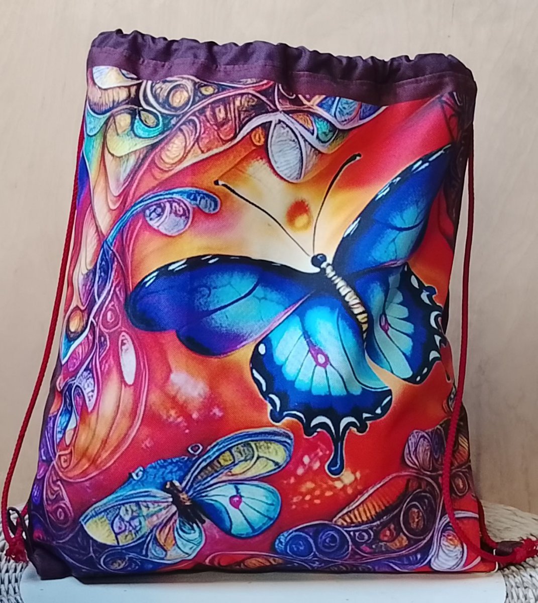 Stahovací vak L motýli 