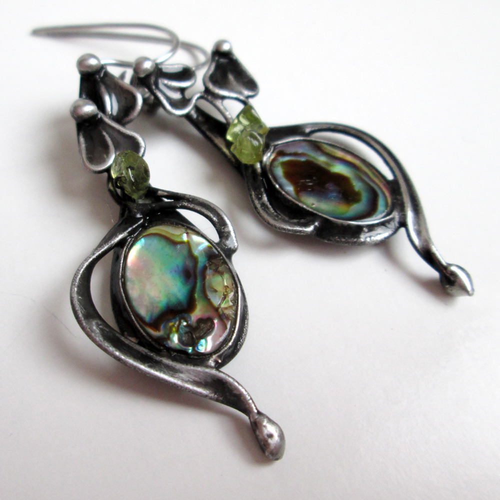 Paua mušle a olivín