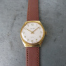 Náramkové hodinky PRIM z roku 1974 ve zlaceném pouzdře