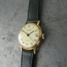 Náramkové hodinky PRIM z roku 1992 zlacené s datumem