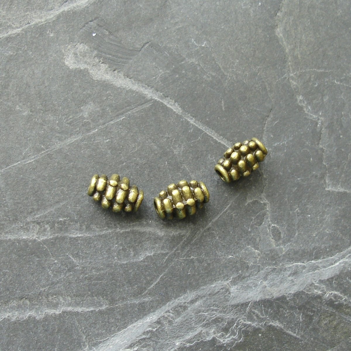 Kovové korálky granáty 7x5mm - starostříbrné - 10 ksstarobronzové