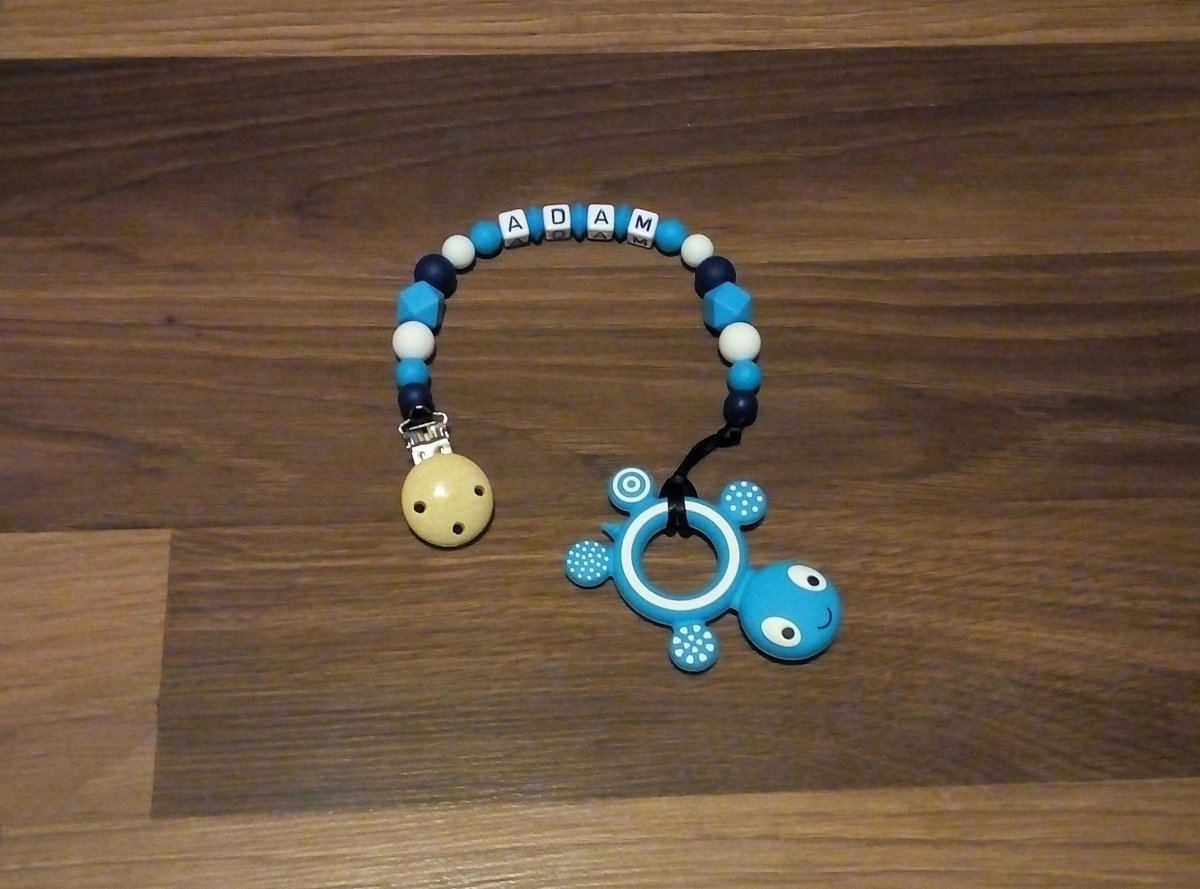 Silikonové kousátko modré se jménem Adam