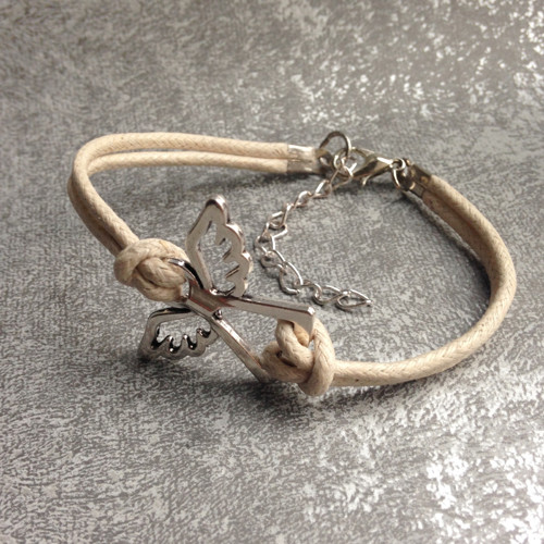 Krémový náramek s andělem