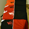 Černo-červené tričko s bílým nebo červeným cyklistou