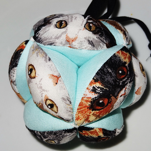 Hlavolam KOČIČÍ OČI