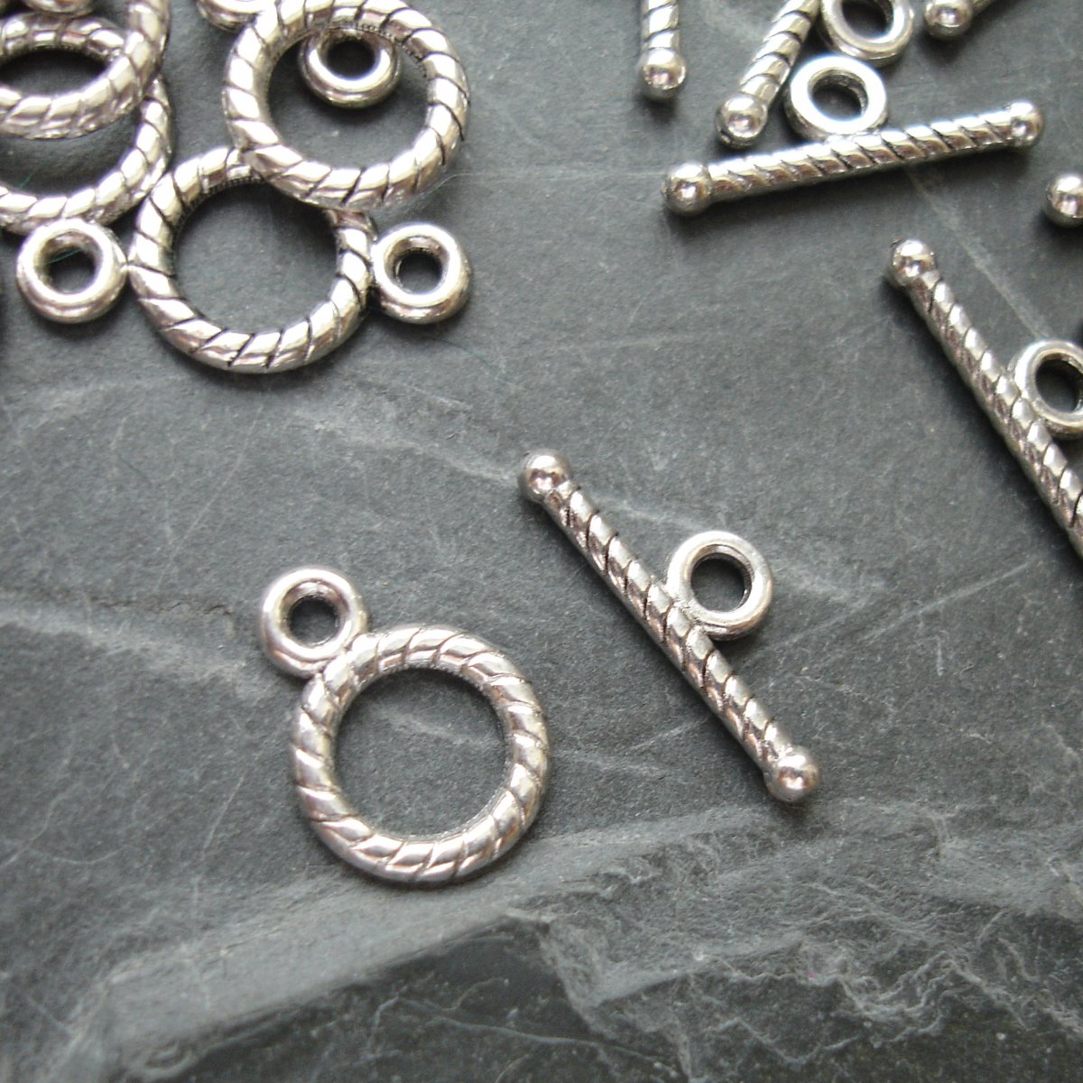 Americké zapínání maličké cca 9 mm - 4 ks - SST