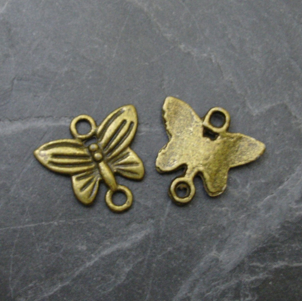 Spojovací díl motýlek 13x14x2 - 4 ks -starobronz