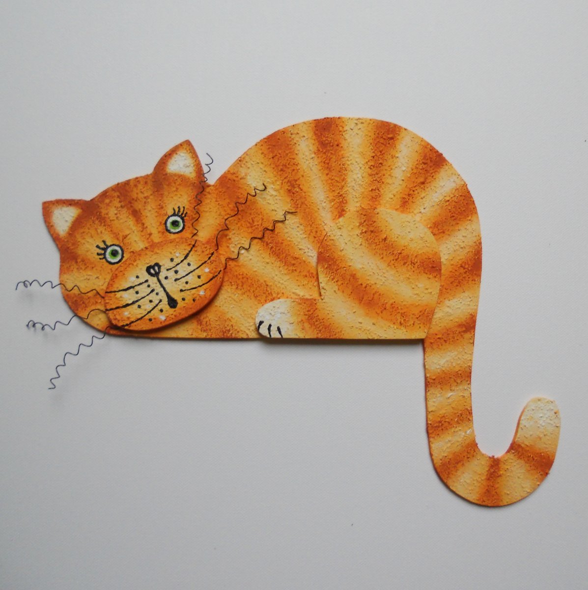 Kočka na dveře rezavá