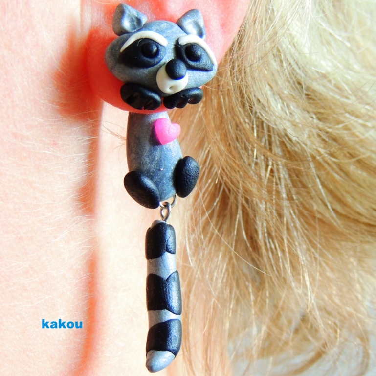 náušnice skrz ucho - mýval