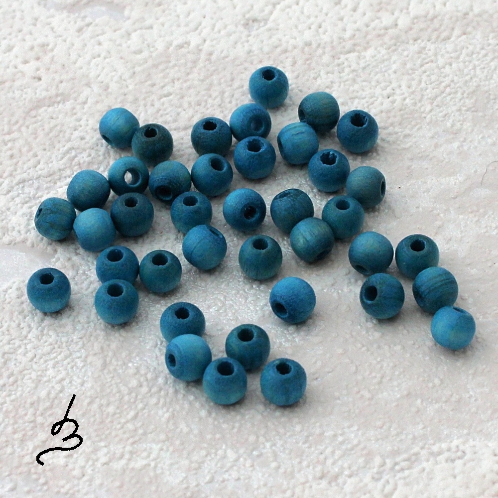 Dřevěné tyrkysové pr. 5 mm - bal. 40 ks