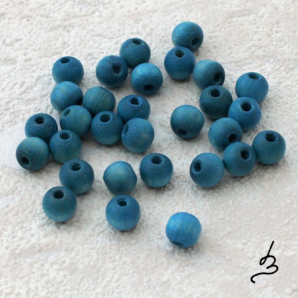 Dřevěné tyrkysové pr. 6 mm - bal. 30 ks