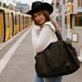 Kožená cestovní taška - tmavě hnědá