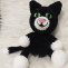 Černobílá mazlící kočička