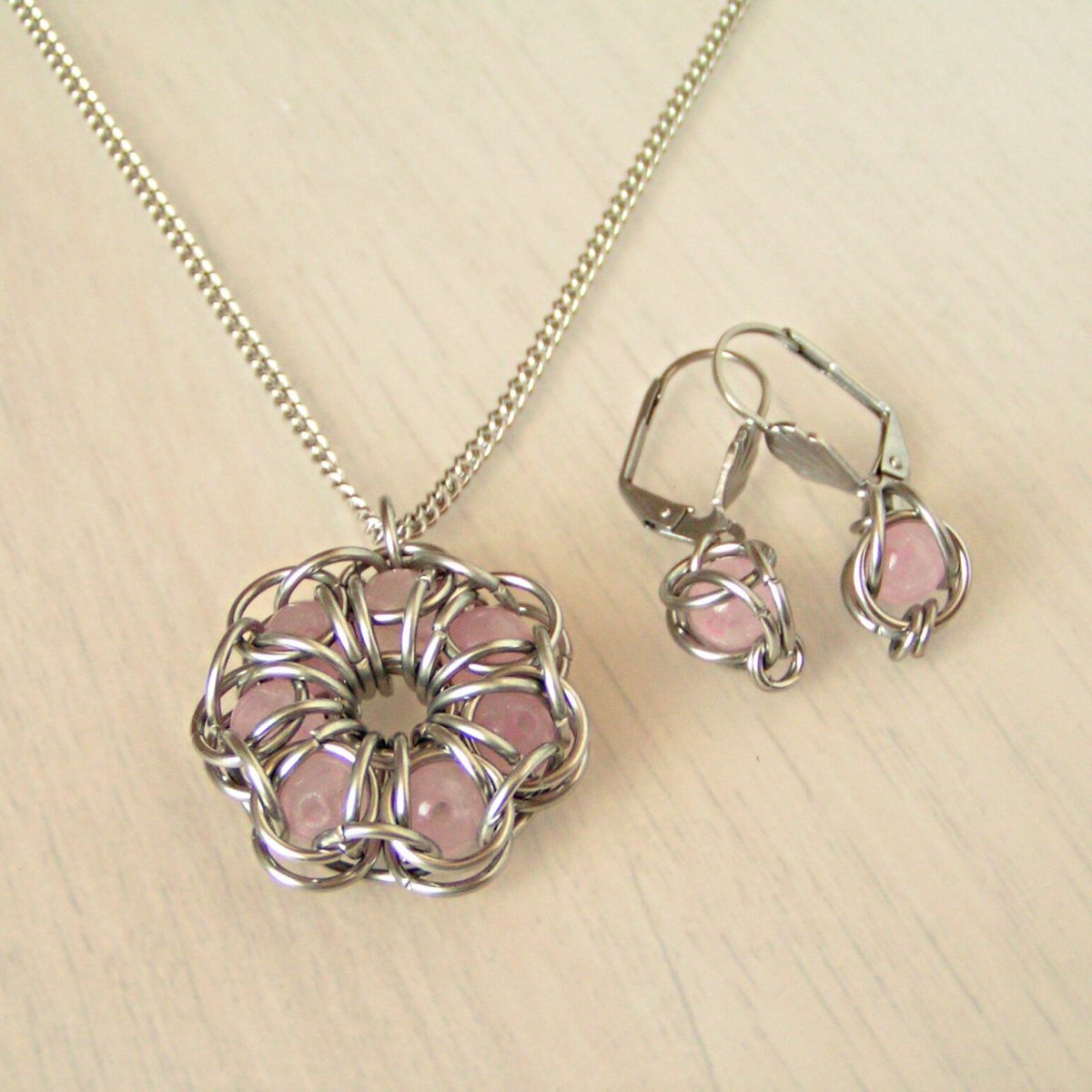 Zakletý květ na řetízku + náušnice