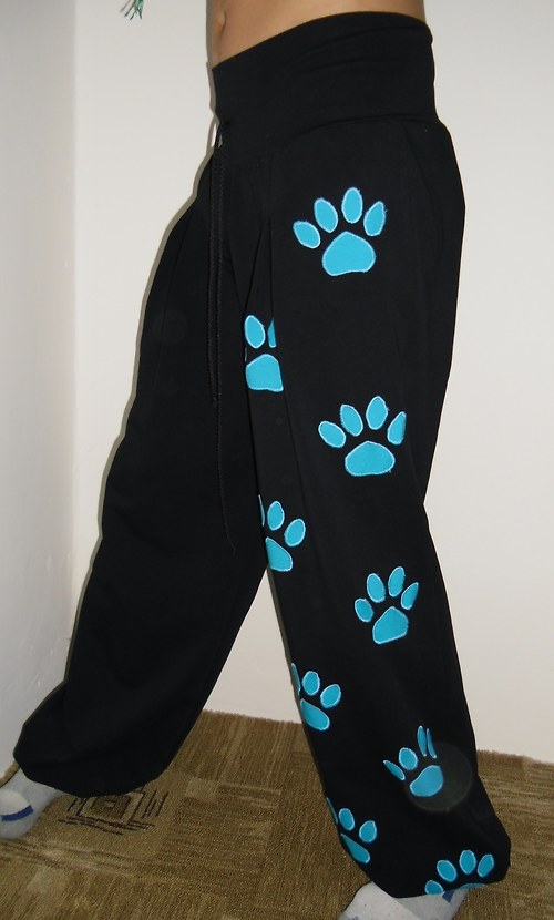 Dětské tepláky černé s tyrkys s tlapkami