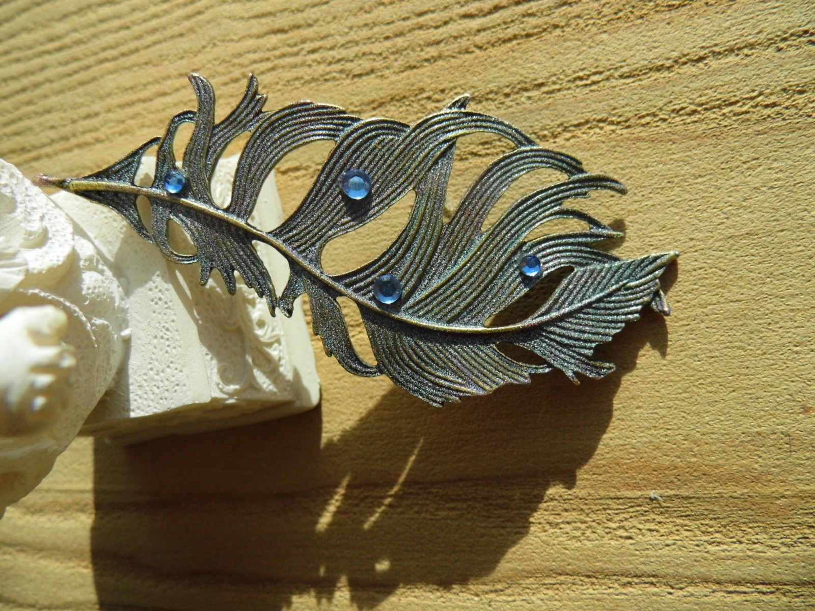 Brož - velké pírko