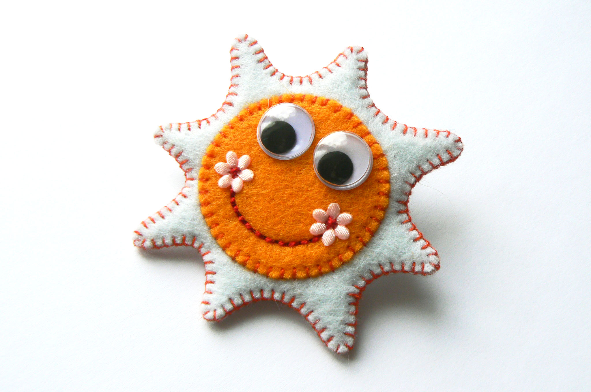 Brož - bílé slunce