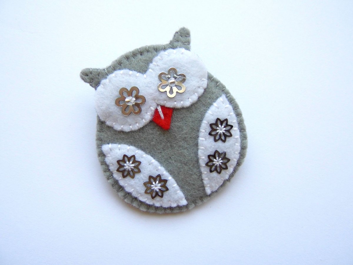 Šedá zimní sovička