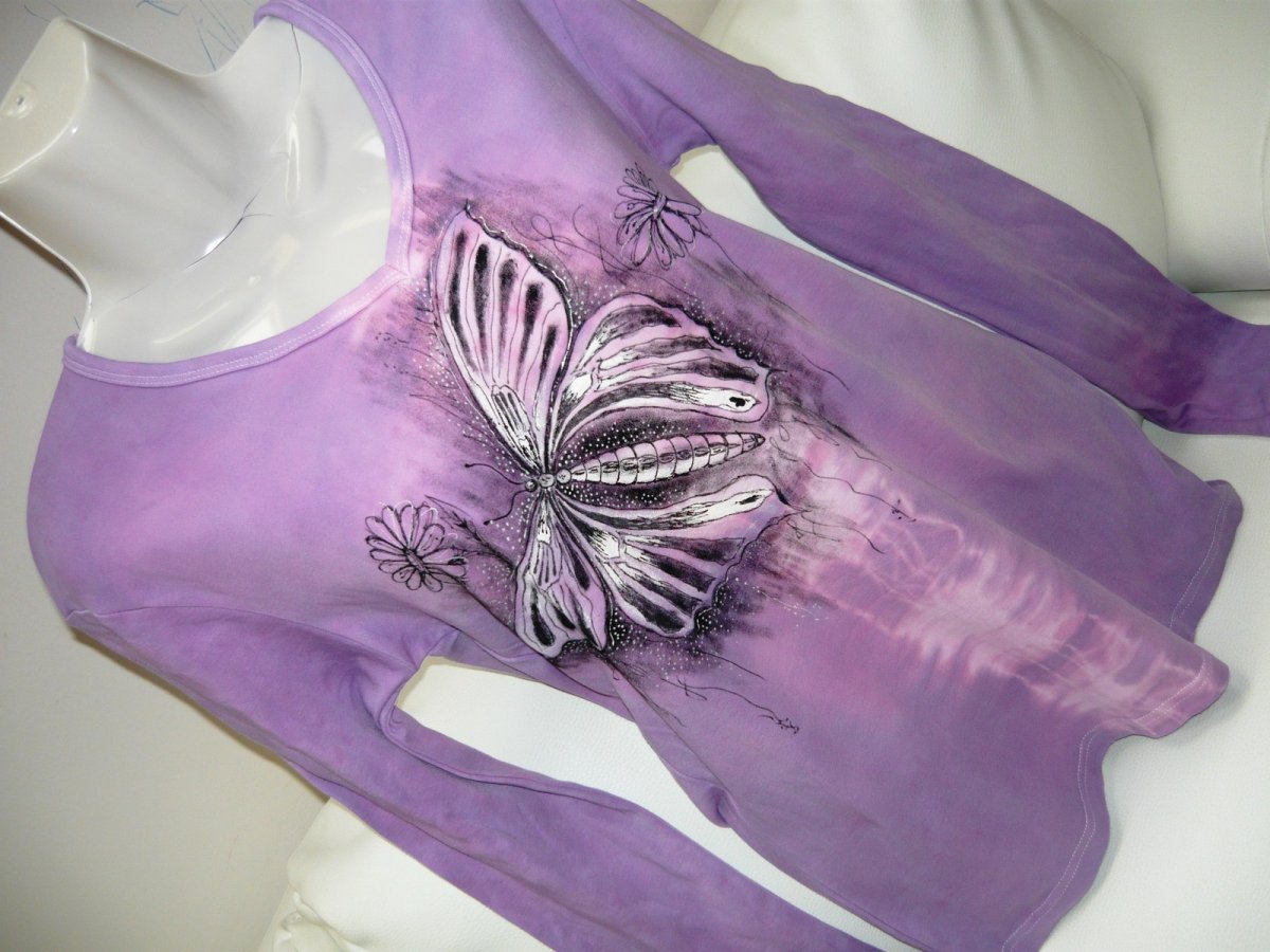 na křídlech motýla