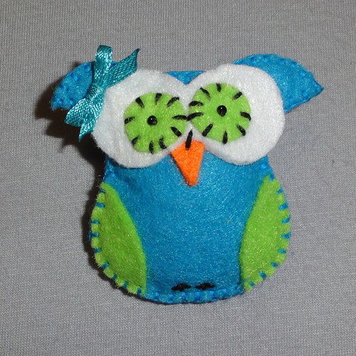 Tyrkysová sovička se zelenými křídly